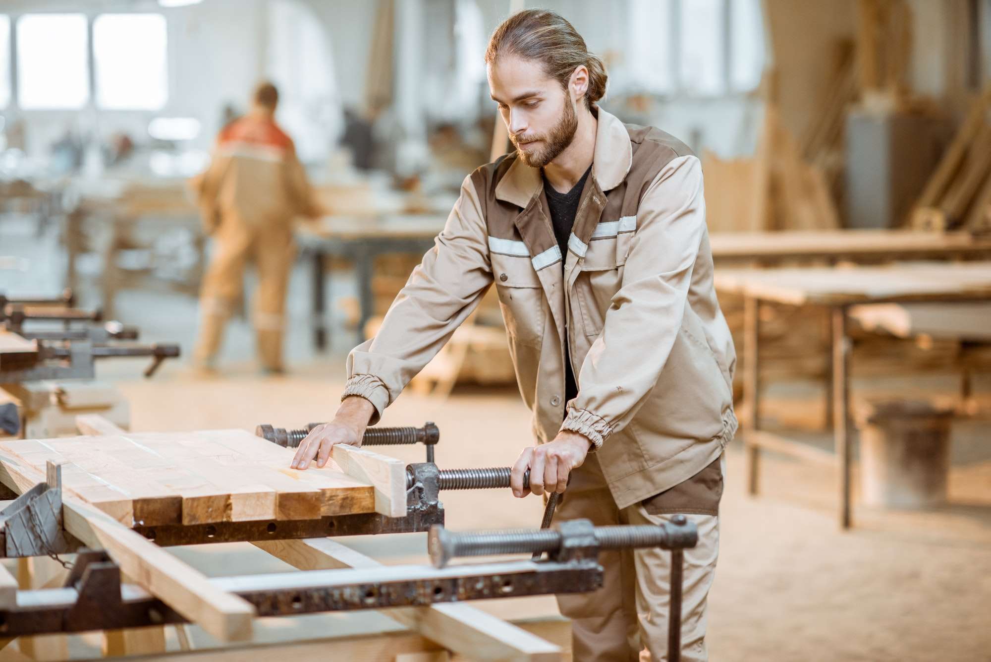 Carpenter working at the carpentry manufacturing
