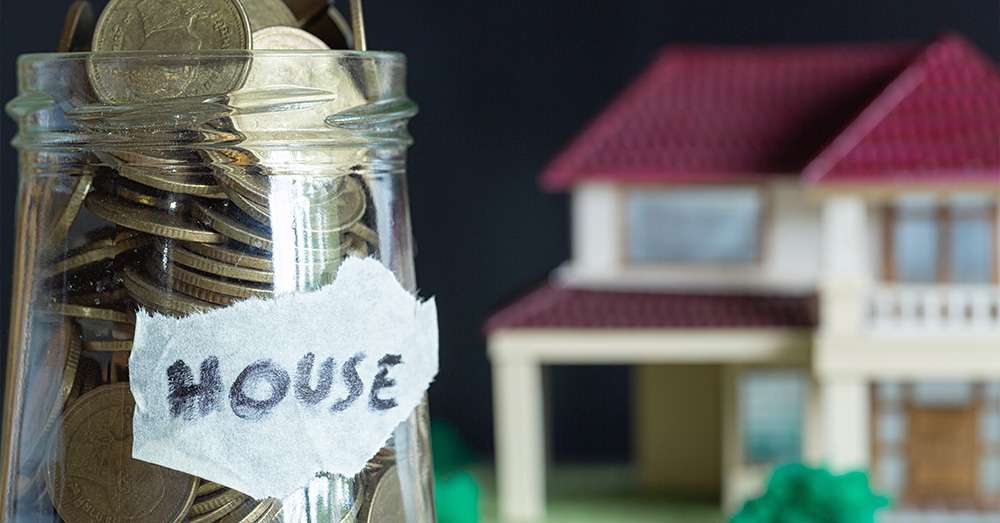 money saving-house-glass-bottle