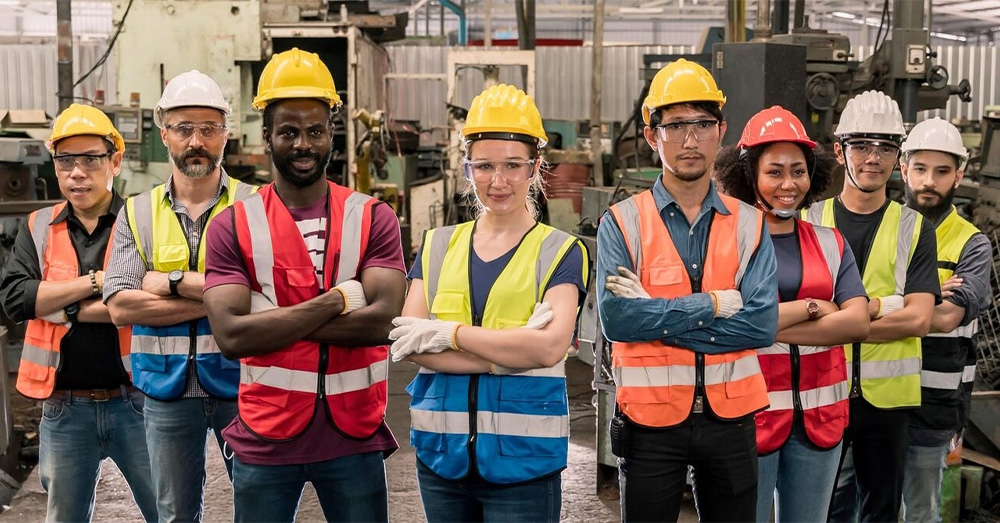 Engineering team with technician and worker operating. group photo in factory, teamwork concept.